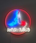 Neon sign with skeleton hand a hand high fiving, with Namaste underneath